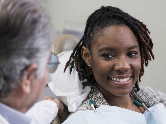 Woman sharing healthy smile after restorative dentistry