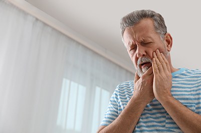 Man with tooth pain