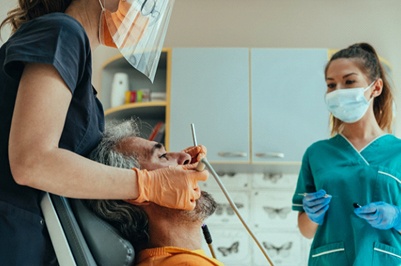 man getting tooth-colored fillings in Putnam