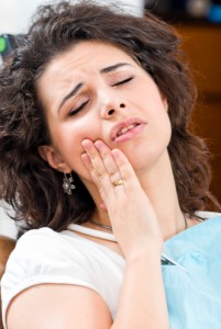 woman with tooth pain